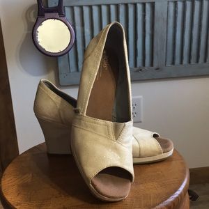 Cream colored sparkly Toms wedges
